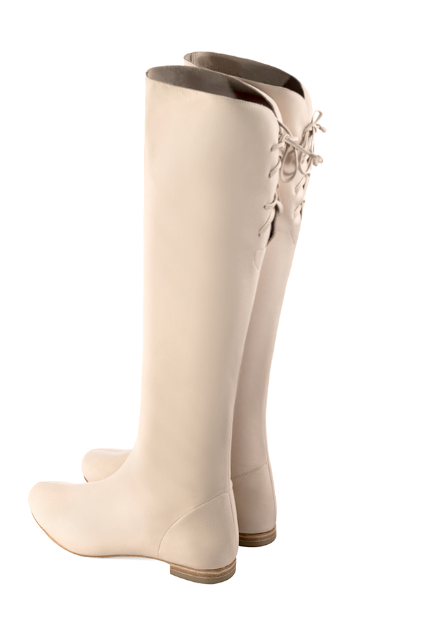 Champagne white women's knee-high boots, with laces at the back. Round toe. Flat leather soles. Made to measure. Rear view - Florence KOOIJMAN